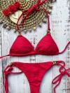 Stringbikini in fraaie rode stof met verfijnde textuur van Mystical Swimwear