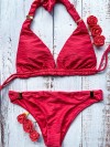 Rode bikini met textuur versierd met gouden schuifsieraden van Mystical Swimwear