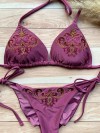 Paarse bikini versierd met gouden kralen en luxe borduursels van Mystical Swimwear