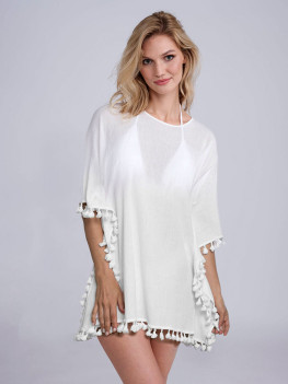 Easy to wear white cover-up with pompom tassels by Pia Rossini