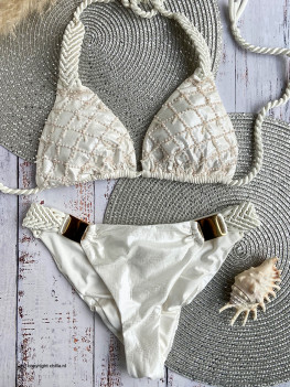 White shiny bikini with snake print texture decorated with beads and macrame from Perla Santa Swimwear