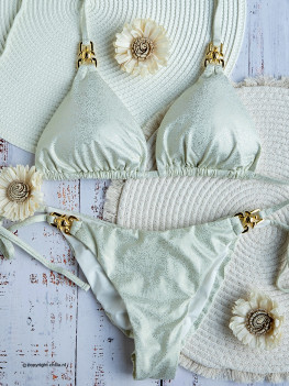 Glamorous ivory white bikini with dotted glow and gold-coated jewelry  - Special Edition