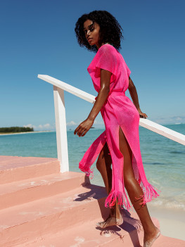 Neon pink poncho with fringes and belt by Luli Fama 2